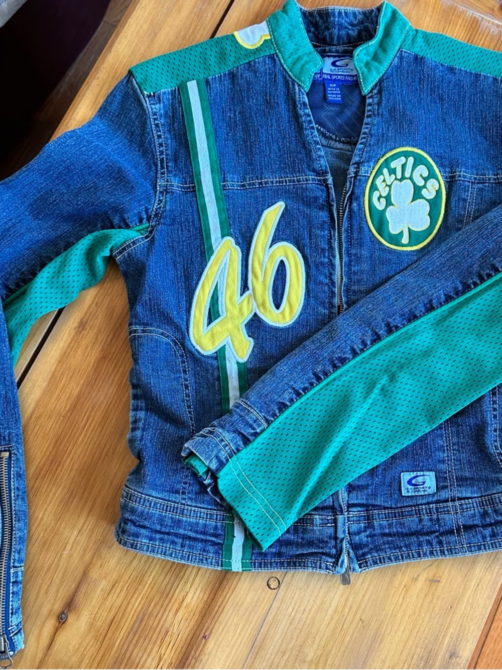 Celtics “46” vintage rare denim jacket with vivid green and yellow accents.